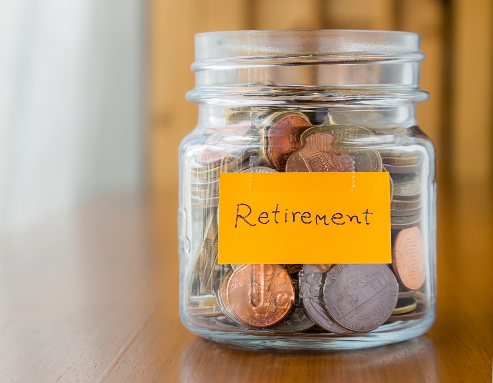 jar of coins with Retirement label